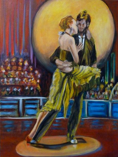 Couple de danseurs de tango argentin sur scène avec lumières et public
